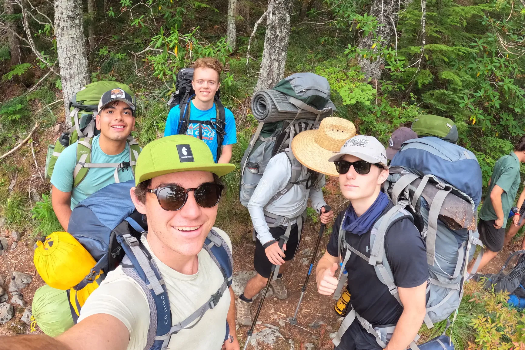 A group of students on a Steppin' Out hike stop for a selfie