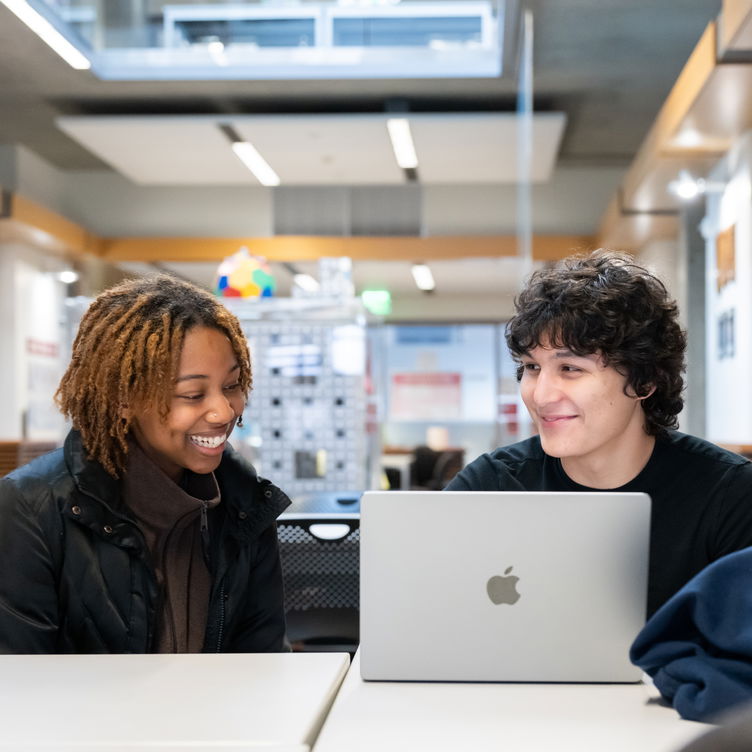 Two Willamette students studying at campus.