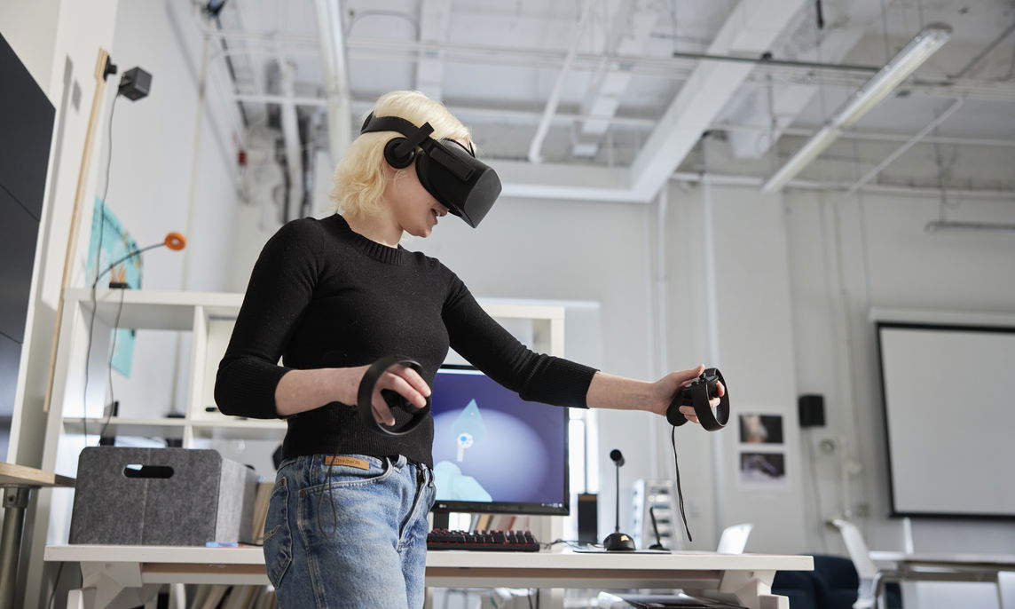 Student using a VR headset.