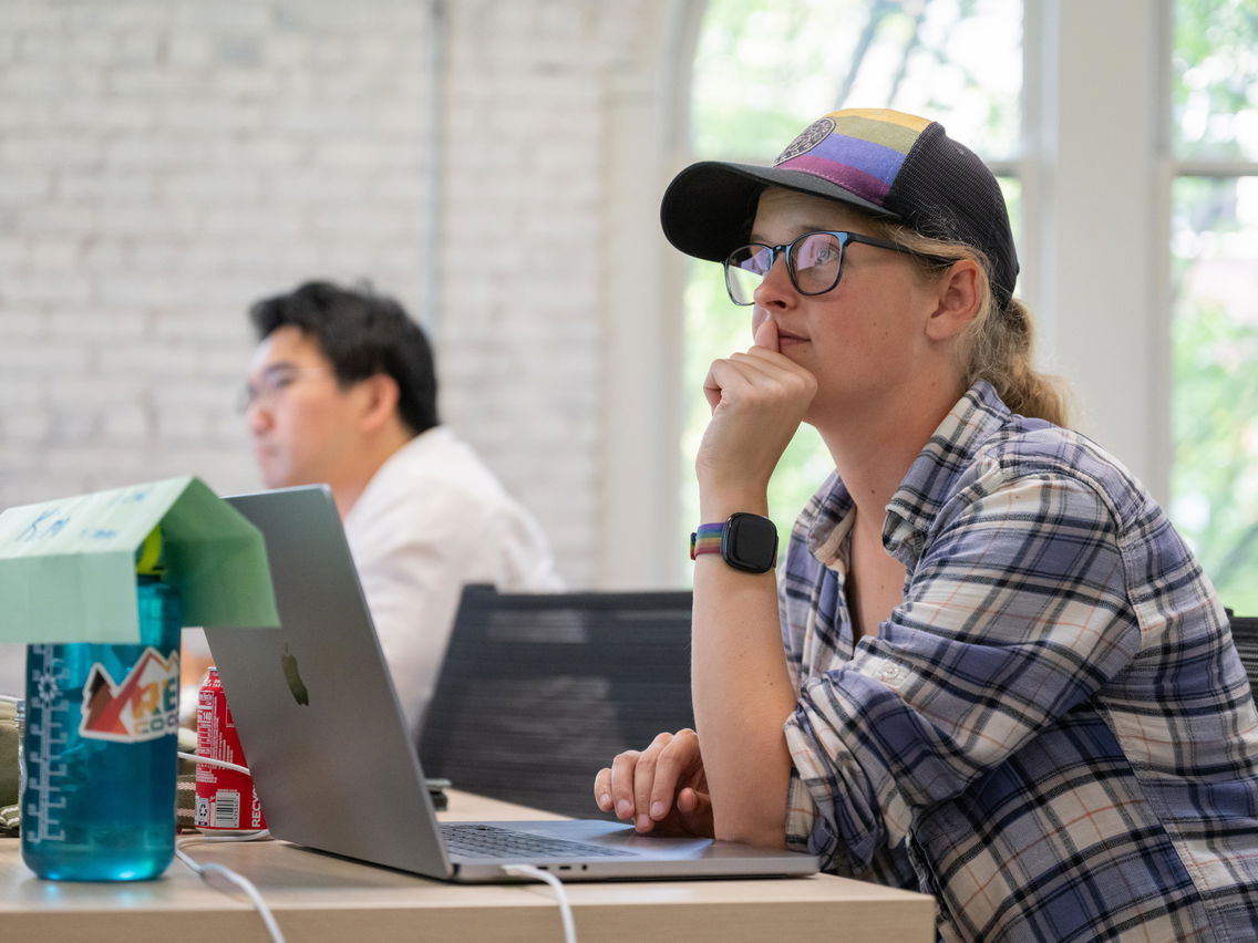 A person looking up in a classroom