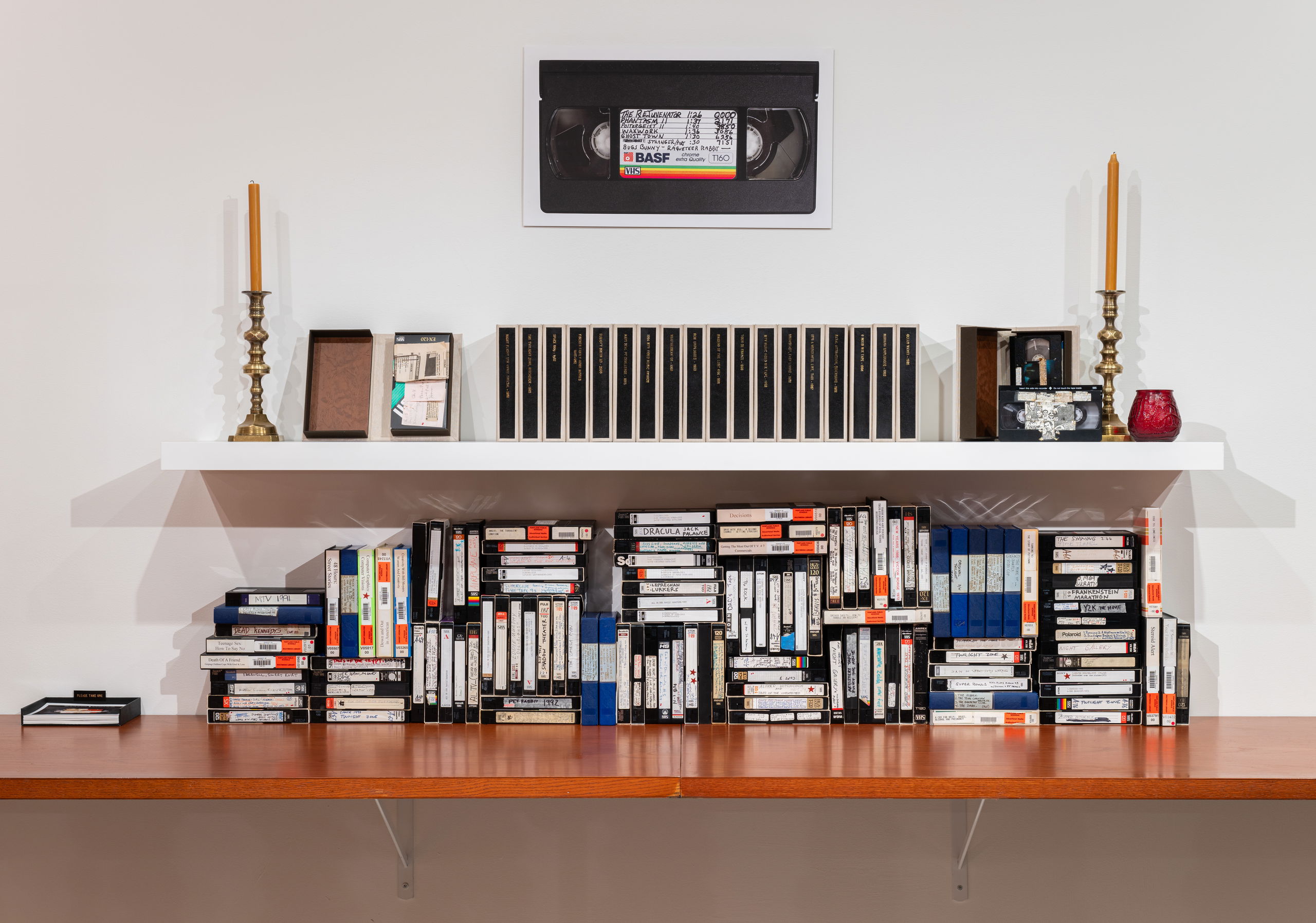 Installation of vhs tapes on a mantle. 