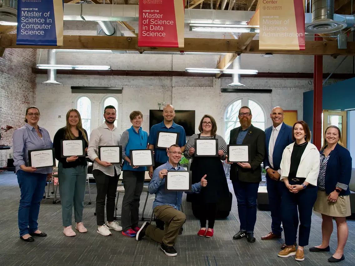A group of EDC Healthcare Leadership students show their certificates