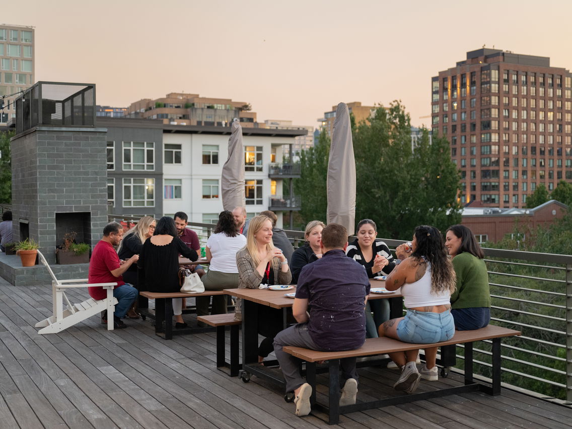 Students eating on the rooftop of Willamette's Graduate and Professional Center. 