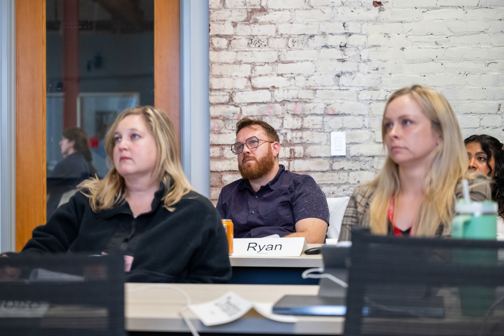 Students listening to a class lecture