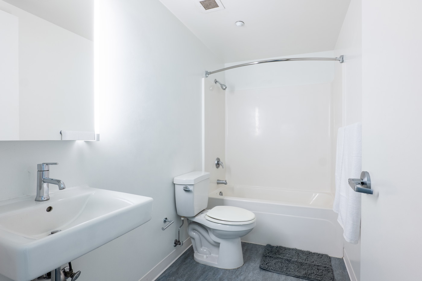 A bathroom in a double apartment