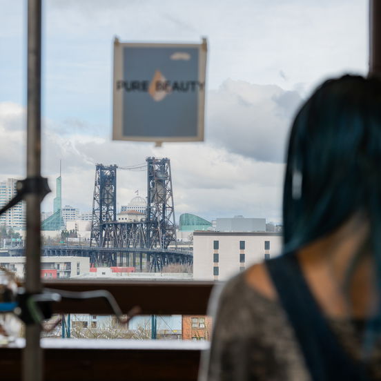 a view of a city through a high window