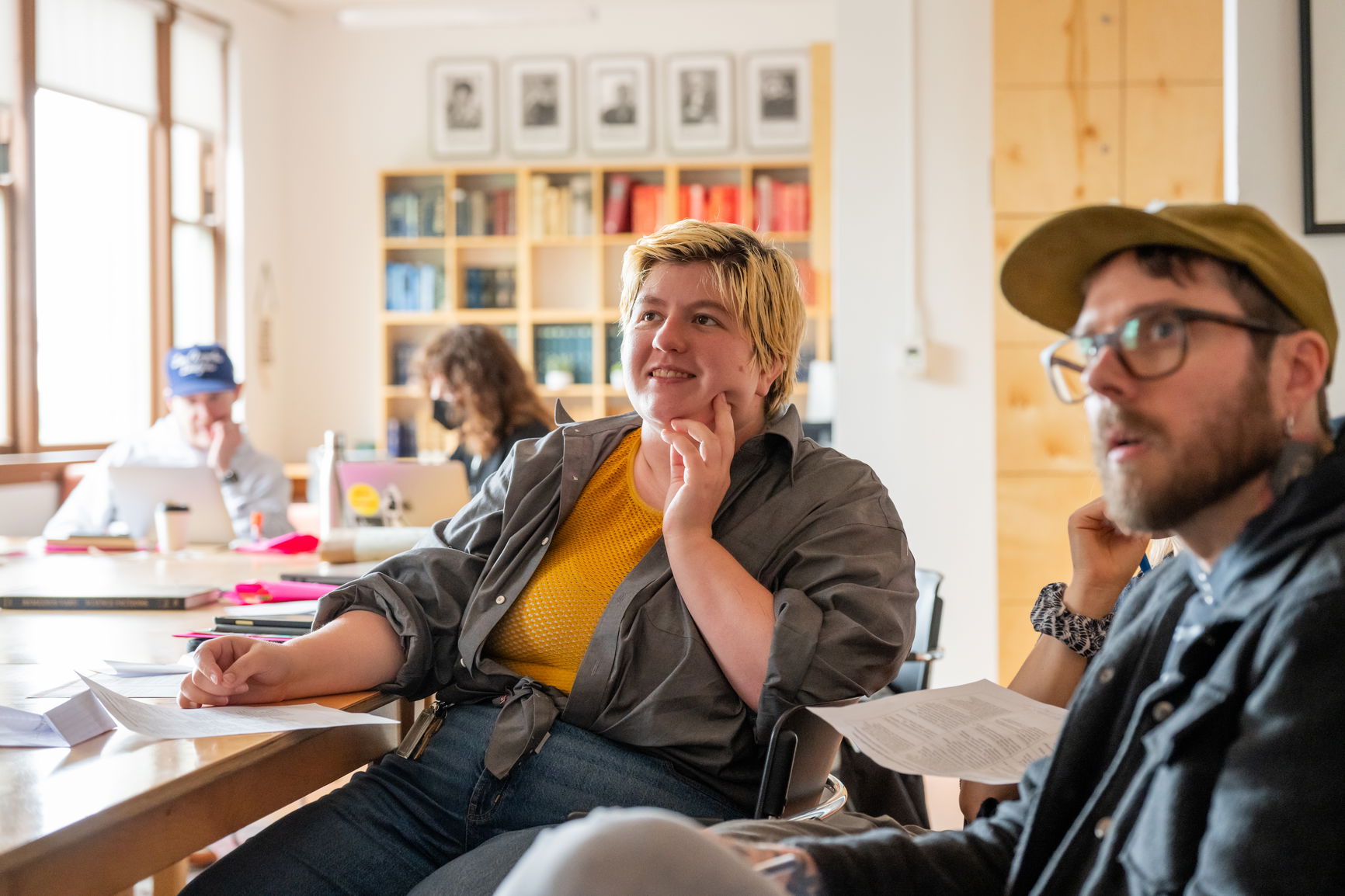 a photo of students in a classroom smiling