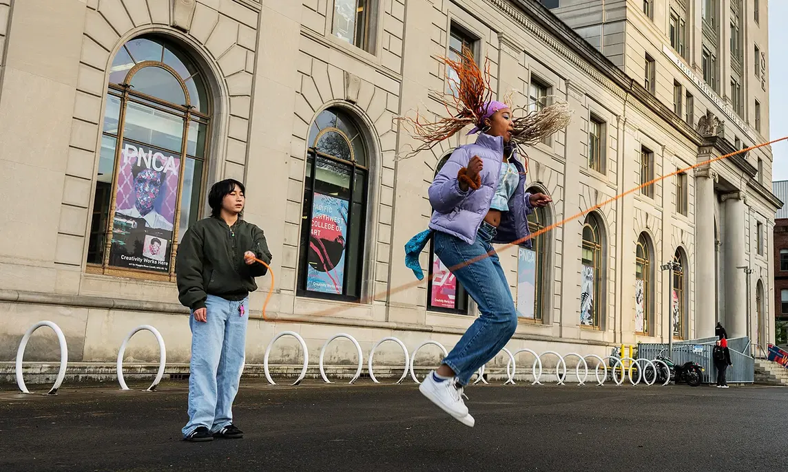 Students skipping rope outside PNCA Campus main building