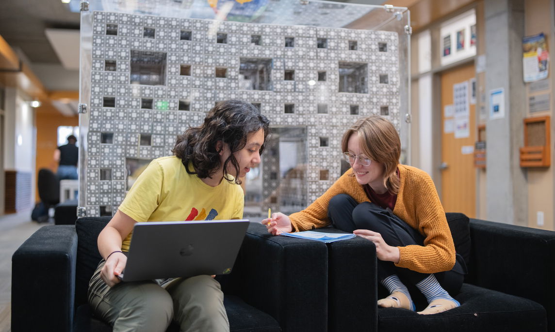 Two students having a study session in Ford Hall at Willamette University in Salem, Oregon.