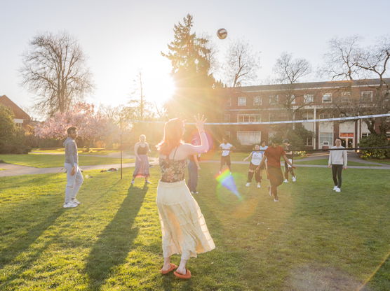 People celebrating on a sunny day on the Quad at Willamette University's Salem campus.