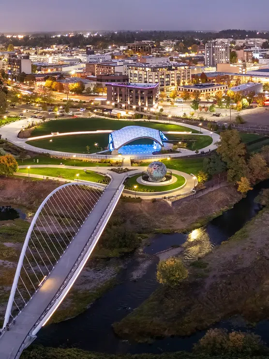 The city of Salem, Oregon in the evening with Riverside Park and Minto Bridge.