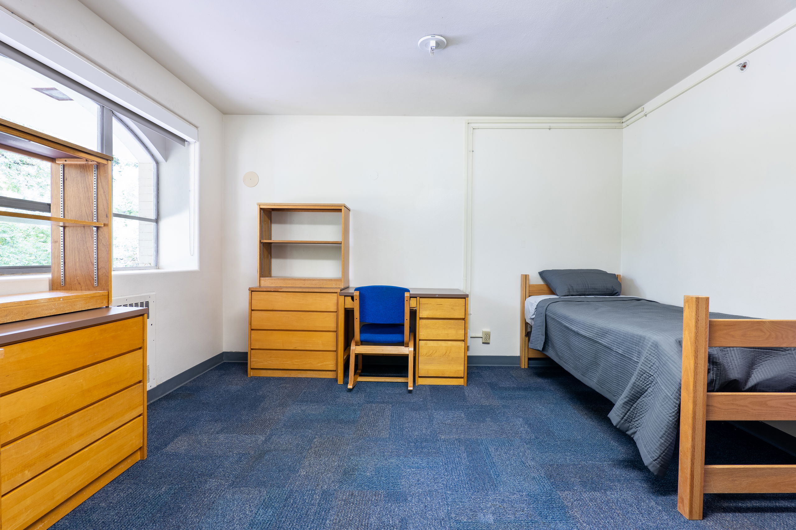 Doney double showing beds, closets, desks, and chairs