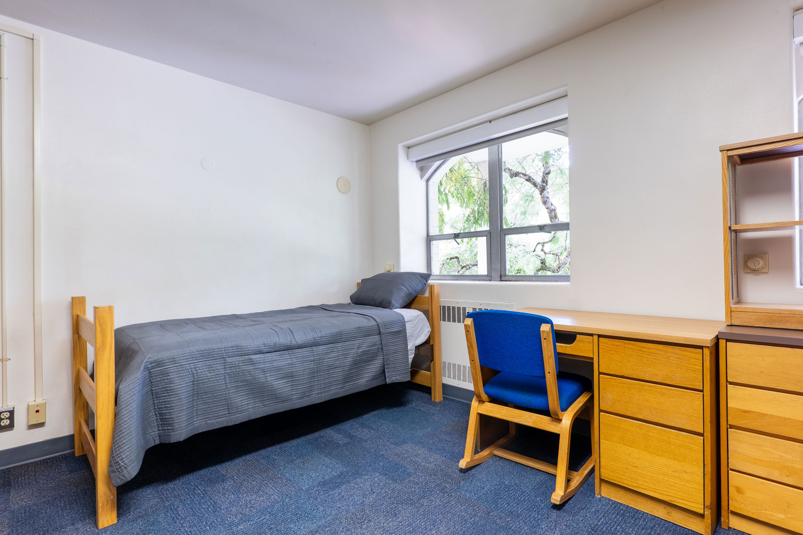 Doney double showing beds, dresser, desks, and chairs