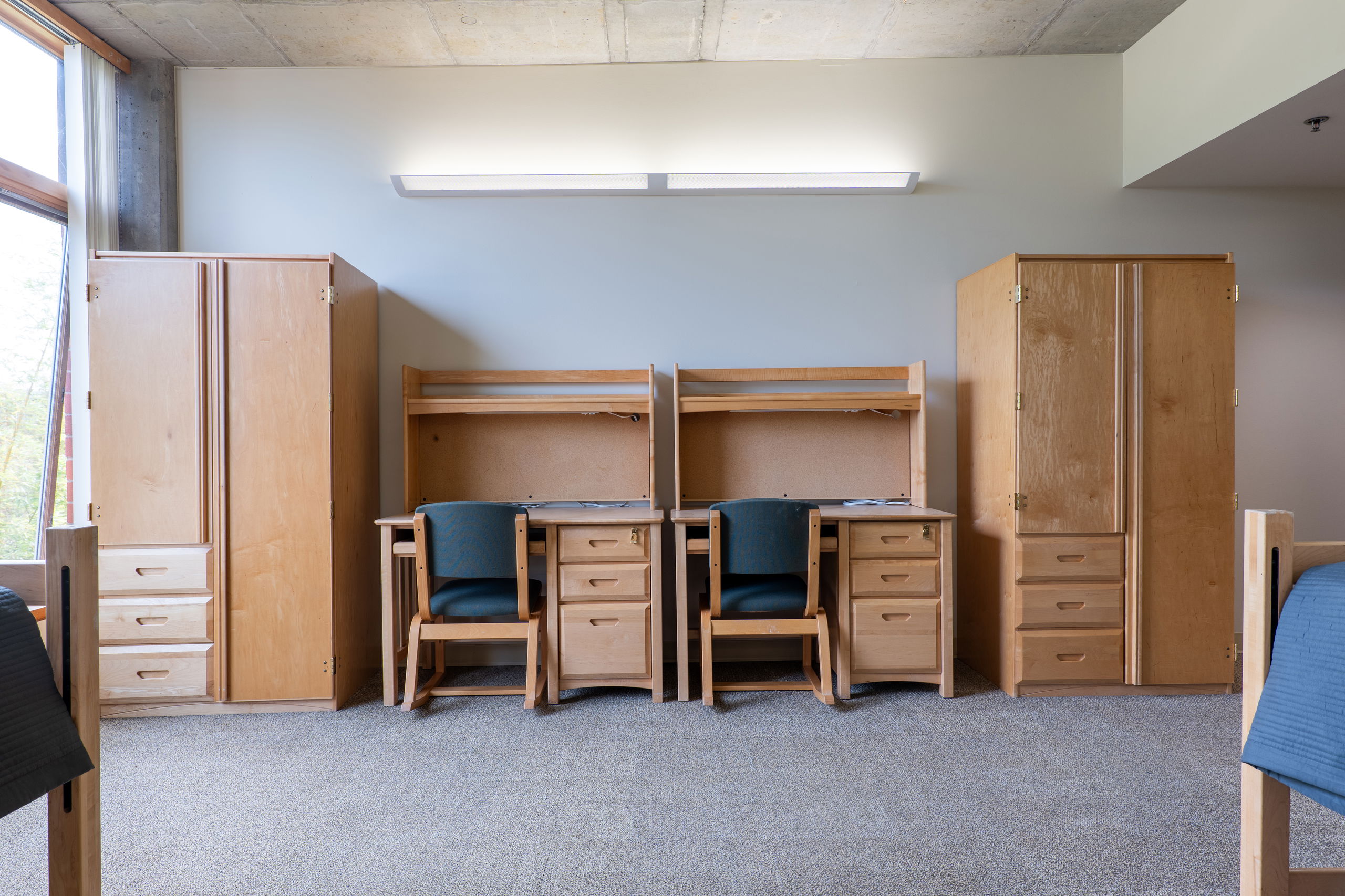 Kaneko double room showing desks, chairs, and armoires