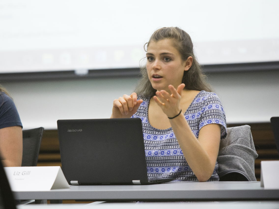 Liz Gill speaking in a class