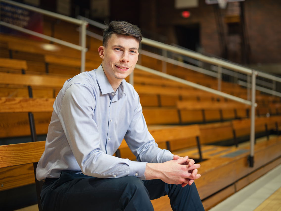 Jack Boydell sits in stands off court