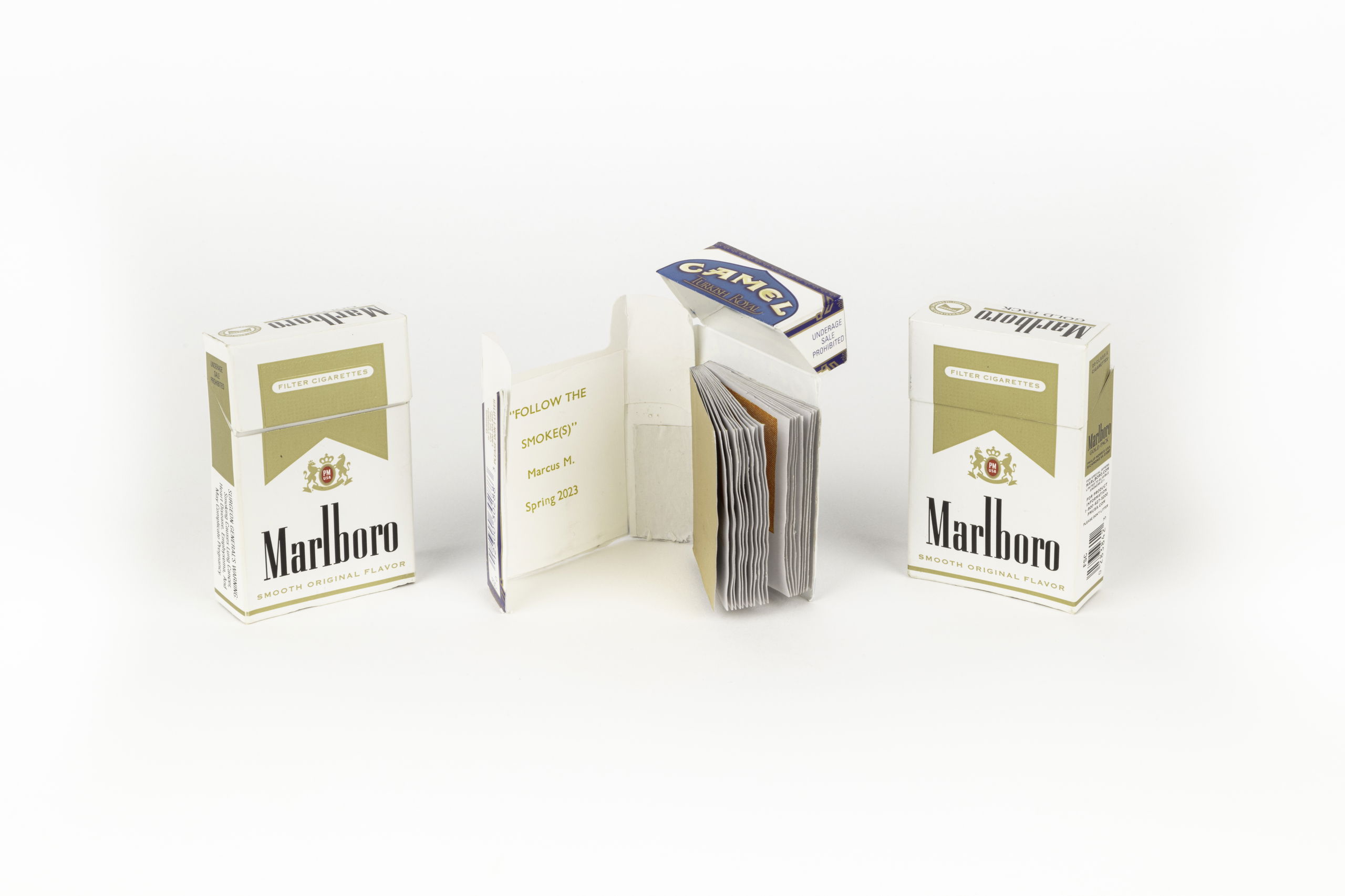 Image of Marlboro cigarette boxes that were made into books. 