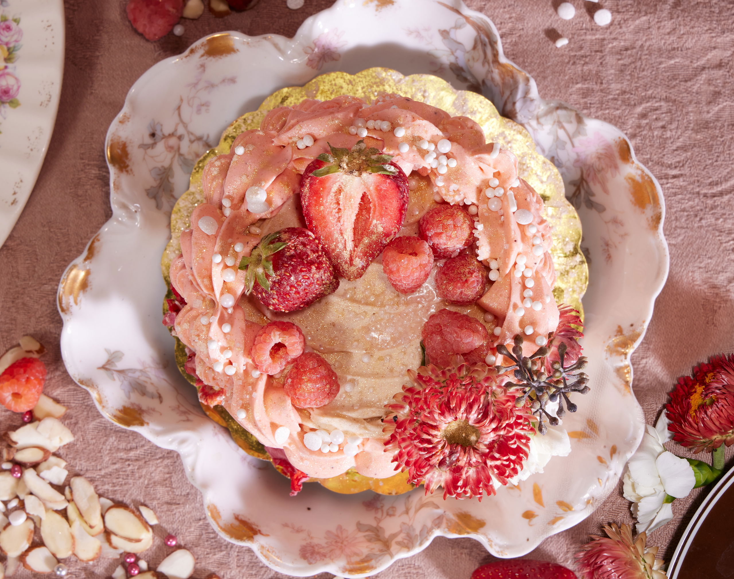 Photograph of strawberry dessert on a ceramic plate. 