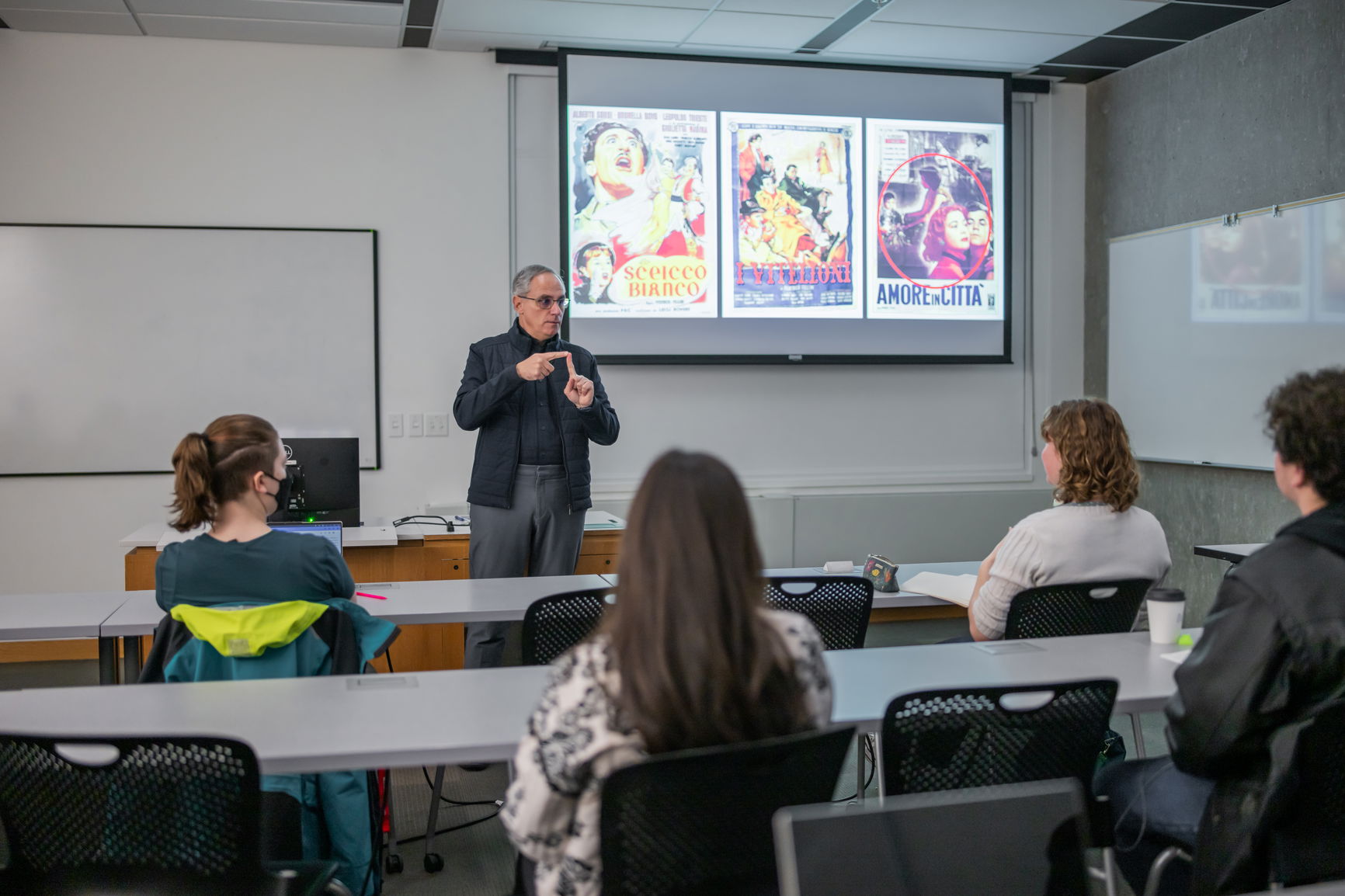 Professor giving a lecture about art history to a classroom