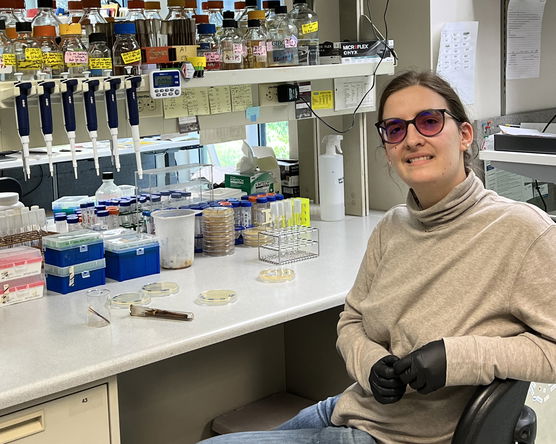 Rachel Dell sitting in the a lab at the Fred Hutchinson Cancer Center.